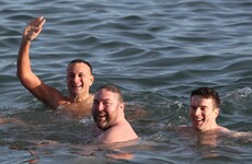 Taoiseach among dozens taking the dive at the Forty Foot for a festive swim today