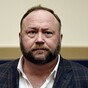 Conspiracy theorist Alex Jones ordered to pay $100k after he claimed Sandy Hook massacre was a hoax