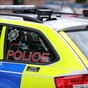 Investigation launched after off-duty police officer confronted at home by masked man with shot-gun