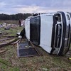 Storms and tornadoes leave at least 10 dead across US