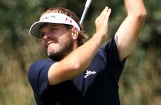 Lara disqualified after caddy tries to hide an extra club in the bushes