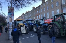 Farmers warn of further 'civil disobedience' as dozens of tractors shut down busy Dublin streets