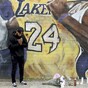 'Words can't describe the pain': Tributes paid to basketball star Kobe Bryant following his death