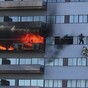 Firefighters rescue man by ladder as he attempts to flee burning high-rise building in LA