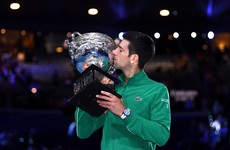 Dizzy, dehydrated Djokovic rallies from brink to win eighth Australian Open
