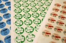 How do people get those jobs at polling stations (and how much do they pay)?