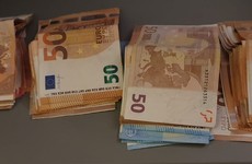 Cars, designer bags and €22,500 in cash seized by CAB after searches in Cork and Tipperary