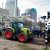 Dutch farmers bring tractors into city in protest over planned emissions policy