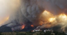 Dramatic photos of canyon wildfires as Colorado residents flee flames