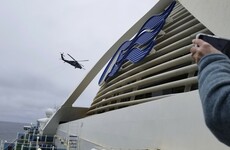 Cruise ship with 3,500 people held off US coast after passenger on previous voyage dies from Covid-19
