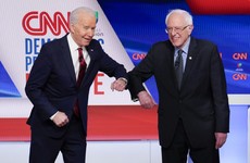 Elbow bumps and no audience as Bernie Sanders and Joe Biden clash on tackling Covid-19