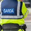 Handgun and sum of cash seized during searches of Limerick properties