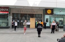 Junior minister concerned about Garda treatment of Debenhams protesters, calls for regular review of powers