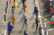 Families take part in socially-distanced mass dance in Dublin