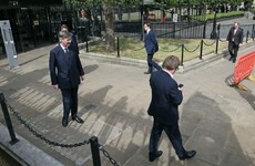 'Insane idea': MPs queue and complain after being forced return to vote in the House of Commons