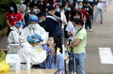 Handful of Covid-19 cases found as Wuhan tests 10 million residents