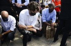 Justin Trudeau takes a knee with Black Lives Matter protesters in Canada