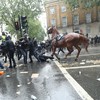 Tensions flare between mounted police and Black Lives Matter protesters in London