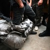 UK police investigate after protesters throw statue of slave-trader MP into Bristol harbour