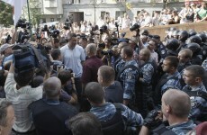 Vitali Klitschko sprayed with tear gas, injures hand