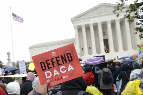 Pro-immigration demonstrators outside the US Supreme Court in Washington DC in October 2019