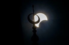 Partial solar eclipse wows stargazers in Africa, Asia and the Middle East
