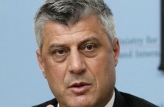 Former Serbian president shakes hand with Kosovo's prime minister