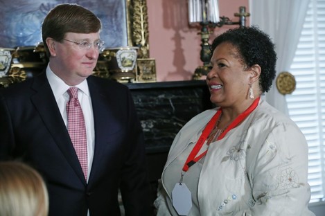 Mississippi Republican Governor Tate Reeves pictured with Reena Evers-Everette, daughter of the slain civil rights activist Medgar Evers, yesterday. 