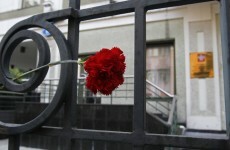 Russia mourns flood dead as questions mount