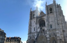Arson inquiry launched as French firefighters battle blaze in Nantes cathedral