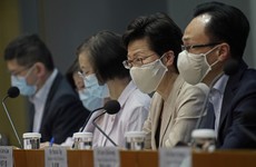 Hong Kong leader says coronavirus now spreading 'out of control'