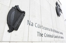 Man who robbed service station and threatened to stab garda jailed for two years