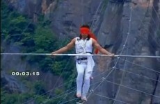 VIDEO: Tightrope walker survives after falling hundreds of feet from wire