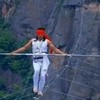 VIDEO: Tightrope walker survives after falling hundreds of feet from wire
