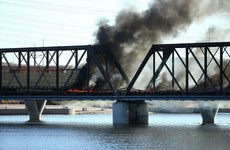 Derailed train causes huge fire and bridge collapse in Arizona