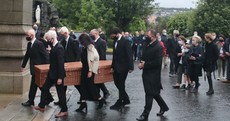 John Hume’s body makes final journey home