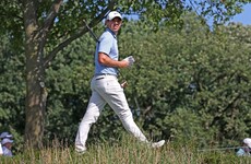 Rory McIlroy powers into share of the lead on day two in Chicago