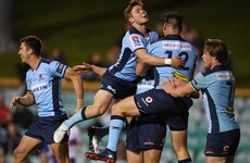 Waratahs keep Super Rugby hopes alive after edging out Rebels in nine-try thriller