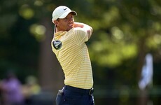 McIlroy three shots behind in Chicago but ready to leave tournament if wife goes into labour
