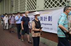 Hong Kong begins China-led mass testing programme for Covid-19
