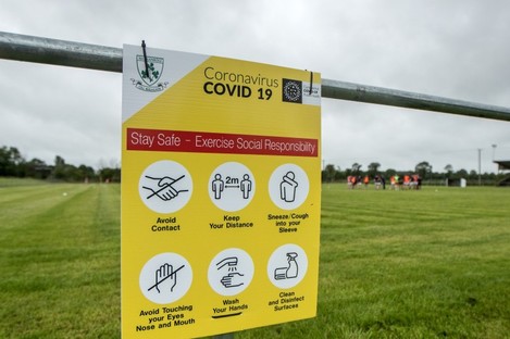 A general view of Covid-19 signage at a GAA pitch.