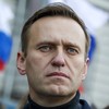 Alexei Navalny out of induced coma and responsive, says German hospital