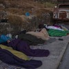 Thousands sleep outside after Greek refugee camp burns down