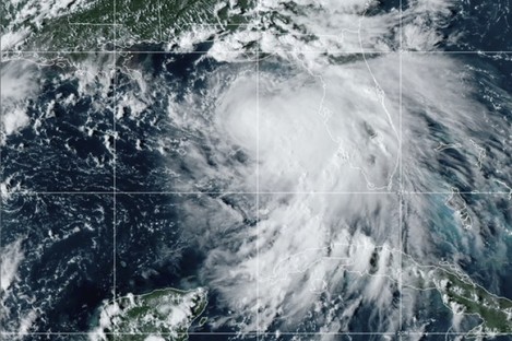 Tropical Storm Sally is shown churning northwards yesterday