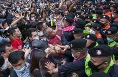 Thailand’s prime minister refuses to quit in face of mass protests amid state of emergency