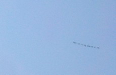 Someone's flying an ominous banner over Penn State demanding Joe Paterno's statue is taken down