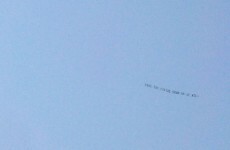 Someone's flying an ominous banner over Penn State demanding Joe Paterno's statue is taken down