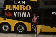 Carapaz takes Vuelta red jersey as Roglic struggles in the rain