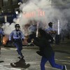 Protests flare in Philadelphia after police kill black man