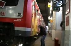 VIDEO: Graffiti artist escapes security - then comes back for his camera